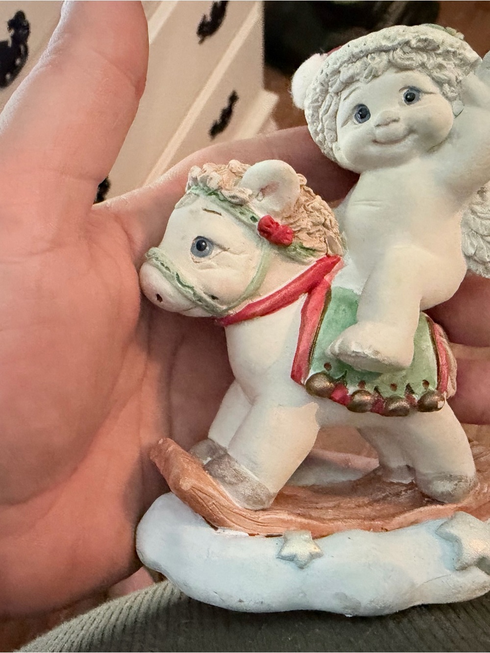Festive White Cherub on Riding Horse Holiday Figurine